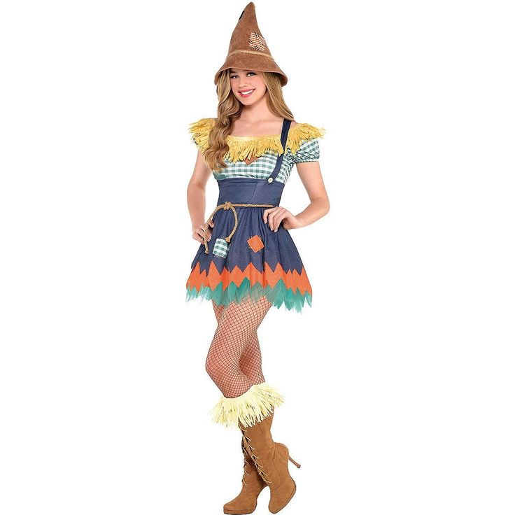 a woman in a costume is posing for the camera while wearing a hat and boots