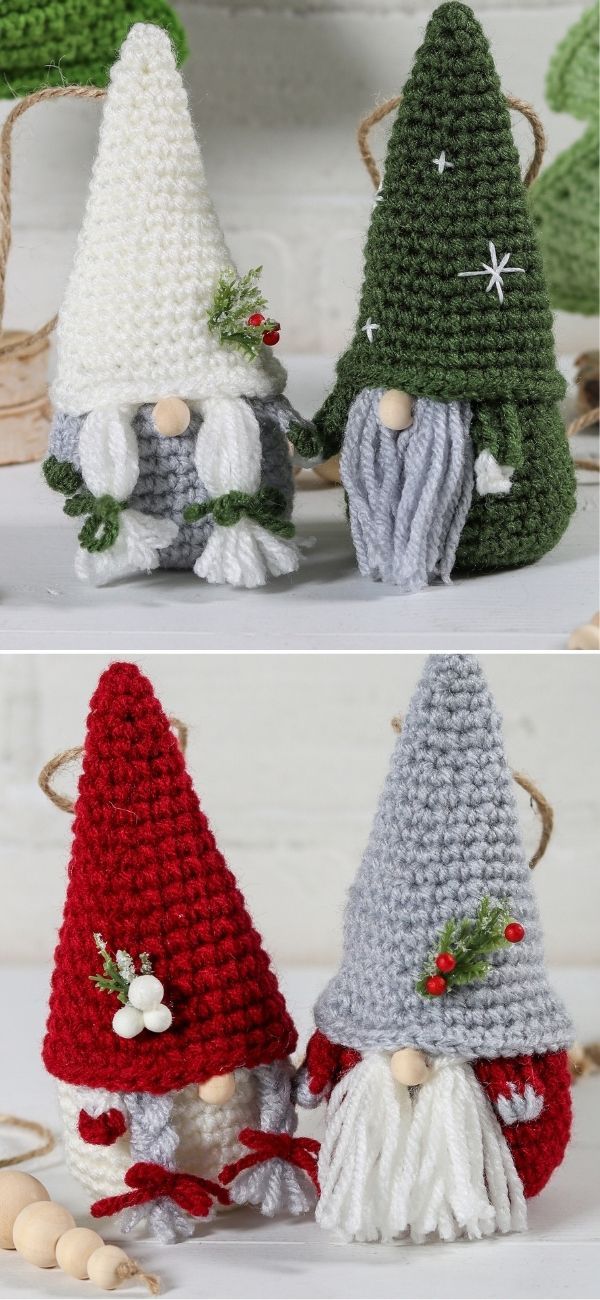 three crocheted gnomes sitting next to each other on top of a table