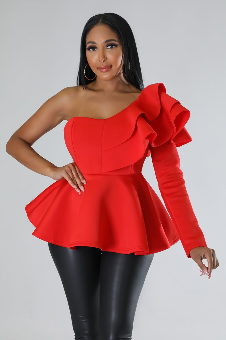 Show your sense of style with our red one-shoulder ruffle blouse. This feminine luxury item is designed to take you from office chic to night-out glam in just a few seconds. Adorned with trend-worthy shoulder detail, this blouse will make dressing up any day a pleasure. Long Sleeve One shoulder Solid color Scuba Fabric Ruffle Zipper on the side Elegant Luxury One-shoulder Cocktail Top, Luxury One-shoulder Top For Formal Occasions, Luxury Ruffled Office Shirt, Luxury One-shoulder Women's Sets, Luxury Stretch Blouse For Office, Luxury Elegant One Shoulder Cocktail Top, Luxury Chic Blouse With Ruffle Sleeves, Flirty Off-shoulder Tops For Party, Chic Red Blouse For Evening