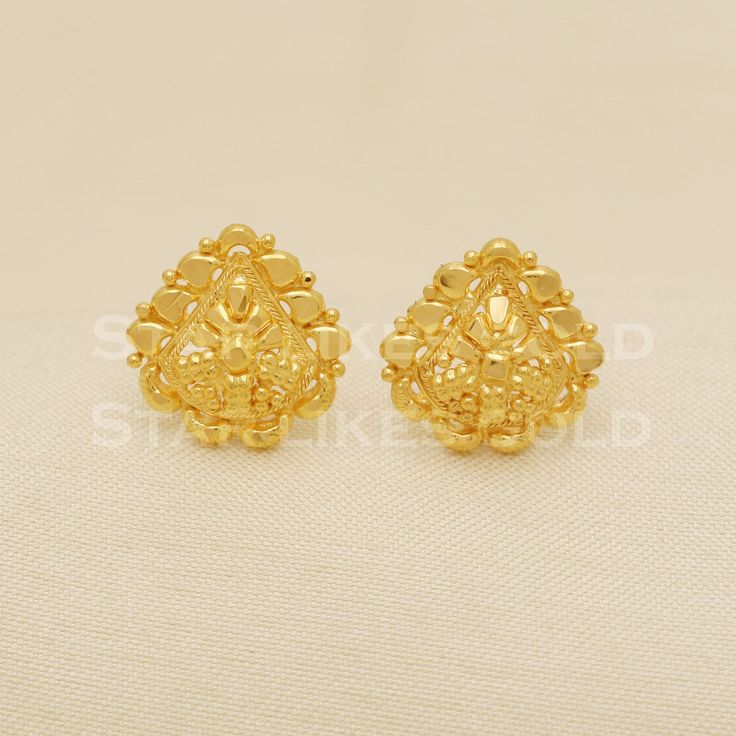 Elevate your style with these beautifully handcrafted gold earrings. Featuring a classic design and a comfortable fit, they add a refined touch to any look. Ideal for everyday wear or special occasions, they bring a subtle yet sophisticated sparkle. 18K Gold Stud Earrings Metal is Real Gold Purity is 18kt Weight is 1.82 grams approx Max Length is 1.2 cm approx Max width is 1.2 cm approx ,  The Earrings comes with normal backs if you need gold screw please contact Please feel free to ask if you h Earrings Metal, Gold Stud Earrings, Gold Stud, Gold Earrings Studs, Gold Studs, Real Gold, Earrings Jewelry, Jewelry Earrings Dangle, Elevate Your Style