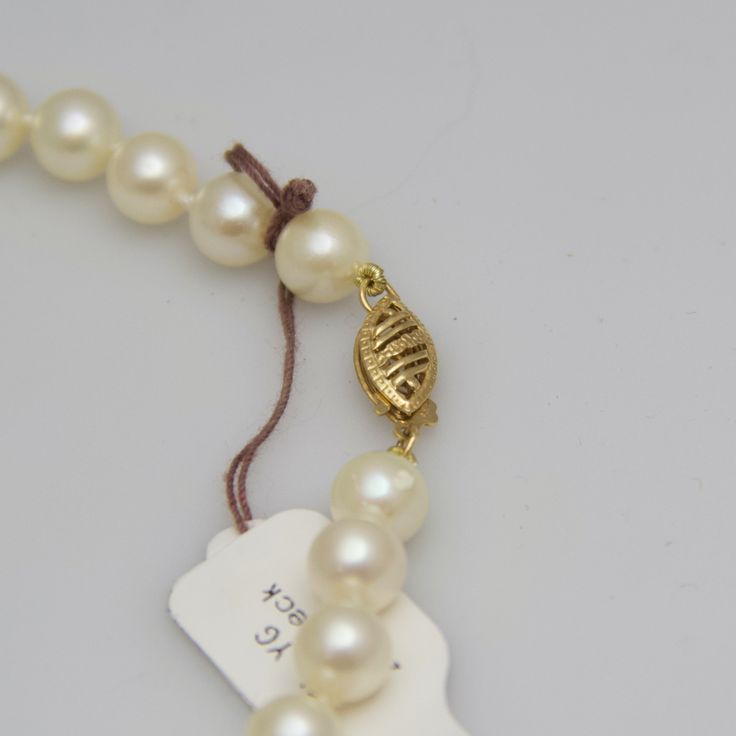 "For sale: (1) d563 14k Yellow Gold Pearl Necklace PLEASE READ ENTIRE DESCRIPTION BEFORE PURCHASING Pre-owned item. Good condition. Please see pictures for details. Sold as is, as seen on pictures. This pearl necklace is bold and beautiful. Its clasp is finely crafted. This would be a wonderful gift for a loved one. Specifics: 14k Yellow gold Pearl Width: 7 mm Length: 24 inches Total Weight: 35.5 grams Please be 100% sure of your purchase before buying, as we do not offer refunds. We are more th Formal Heirloom Necklace Stamped 14k, Elegant Oval 14k Stamped Necklace, Classic 14k Gold Pearl Necklace, Classic 14k Yellow Gold Pearl Necklace, Formal 14k Gold Pearl Necklace, Classic Single Strand Pearl Necklace In 14k Gold, Luxury Formal 14k Stamped Necklaces, Timeless 14k Gold Pearl Necklace For Formal Occasions, Formal 14k Gold Timeless Pearl Necklace