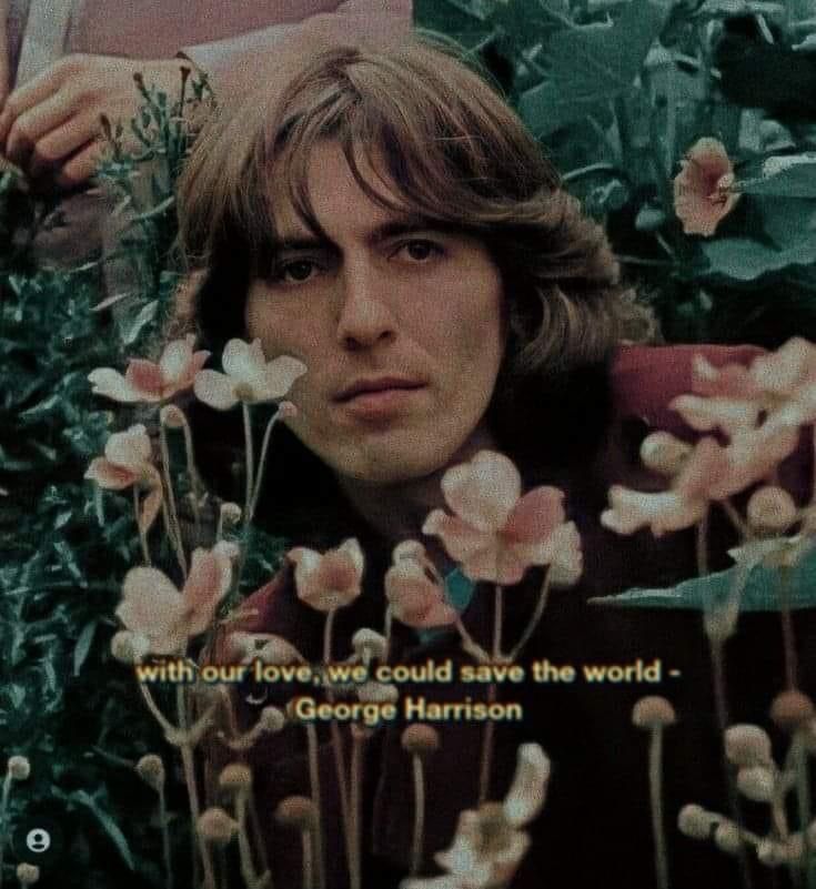 george harrison with flowers in the foreground and quote from john lennon on his photo