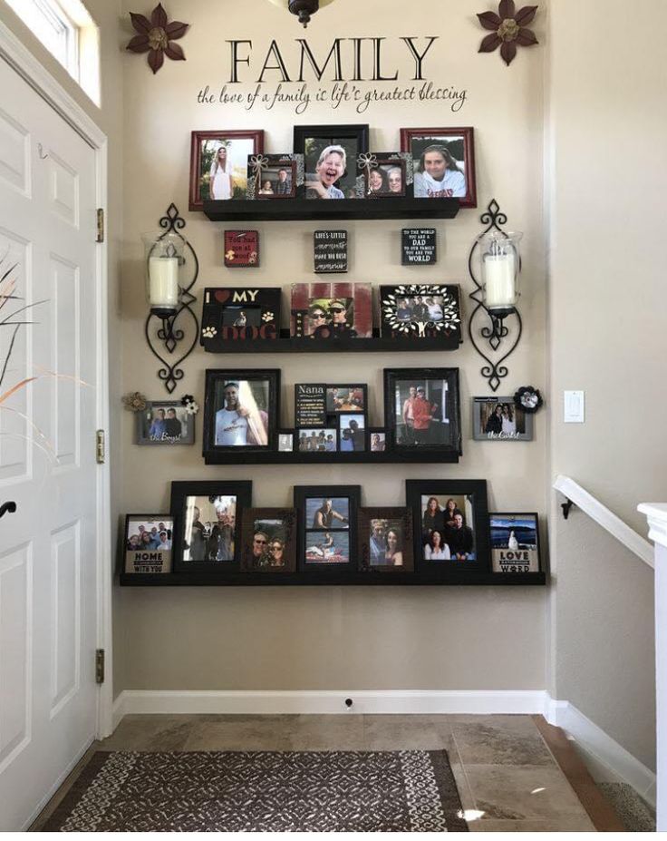 a family wall with many pictures on it