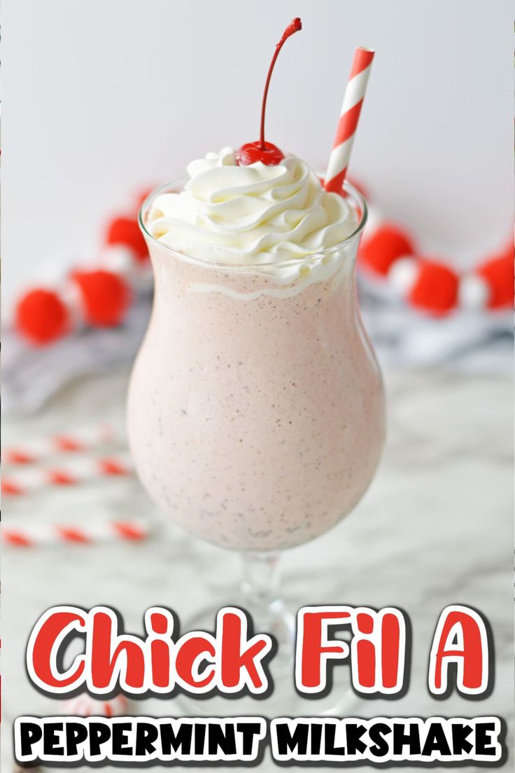 a drink in a glass with whipped cream and candy canes on the side that says, chick fi a peppermint milkshake