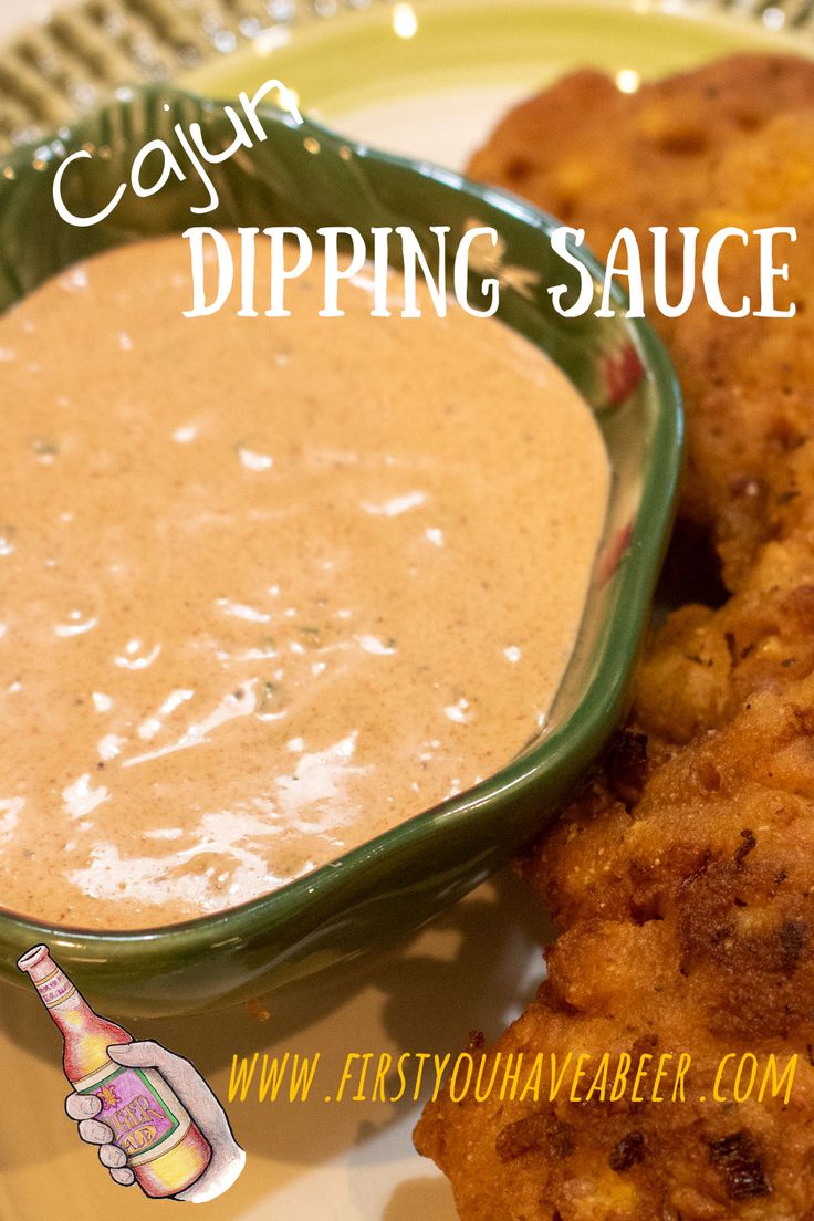 a plate topped with fried food and dipping sauce