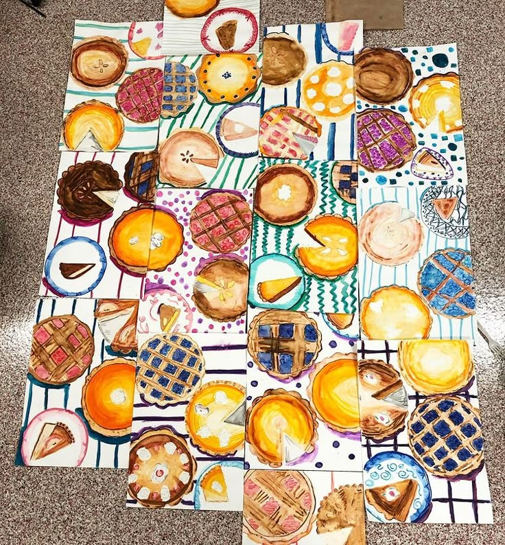 a table topped with lots of different types of pastries