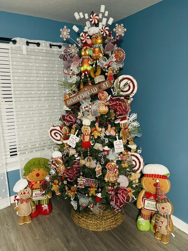 a christmas tree decorated with candy canes and candies