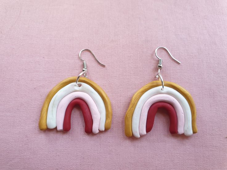 Handcrafted, pastel coloured, rainbow drop earrings to brighten your day! They have silver stainless steel hooks to suit even the most sensitive of ears, and are light weight and comfortable to wear.  These earrings are 4cm wide, and 3cm in length. However, since these earring have been handmade by yours truly, I am happy to make more with different requested colours and measurements! Handmade Rainbow Earrings For Everyday, Rainbow Dangle Earrings For Everyday, Handmade Rainbow Earrings For Everyday Wear, Playful Rainbow Earrings With Ear Wire, Playful Hypoallergenic Rainbow Earrings, Trendy Rainbow Hypoallergenic Earrings, Rainbow Earrings, Pastel Rainbow, Yours Truly