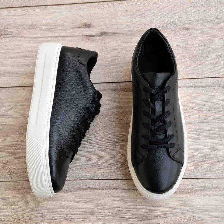 Experience luxury and comfort with these gorgeous Black Genuine Leather Sneakers. Crafted with premium genuine leather, these sneakers feature a high sole that looks stunning and provides unbeatable support. Step into style with these stunning shoes! Luxury Leather Chunky Sneakers For Streetwear, Luxury High-top Sneakers With Stitched Sole, Modern Custom Sneakers With Stitched Sole And Round Toe, Luxury High-top Chunky Sneakers With Rubber Sole, Modern Low-top Lace-up Shoes With Leather Sole, Calf Leather Low-top Platform Sneakers For Streetwear, Low-top Calf Leather Platform Sneakers For Streetwear, Black Sneakers With Vulcanized Sole In Calf Leather, Luxury Chunky Sneakers With Contrast Sole And Lace-up