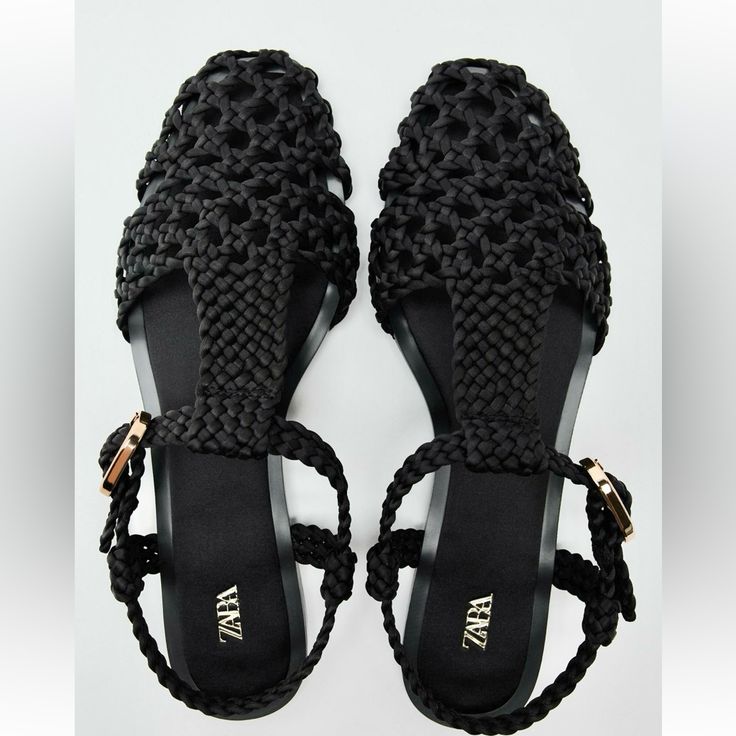 Genuine Zara New With Tag Material: Sateen Effect Fabric Upper Color: Black Simple & So Chic Flat Cage Sandals. Love Love Woven Sateen Upper, T-Strap, & Buckle Closure. Euro Size 39(8), 40(9) Chic Jelly Sandals For Vacation, Chic Black Jelly Sandals For Summer, Zara Black Sandals For Vacation, Chic Flat Heel Jelly Sandals For Vacation, Summer Black Flat Jelly Sandals, Black Flat Jelly Sandals For Summer, Black Jelly Sandals For Beach, Chic Ankle Strap Jelly Sandals For The Beach, Chic Adjustable Flat Jelly Sandals