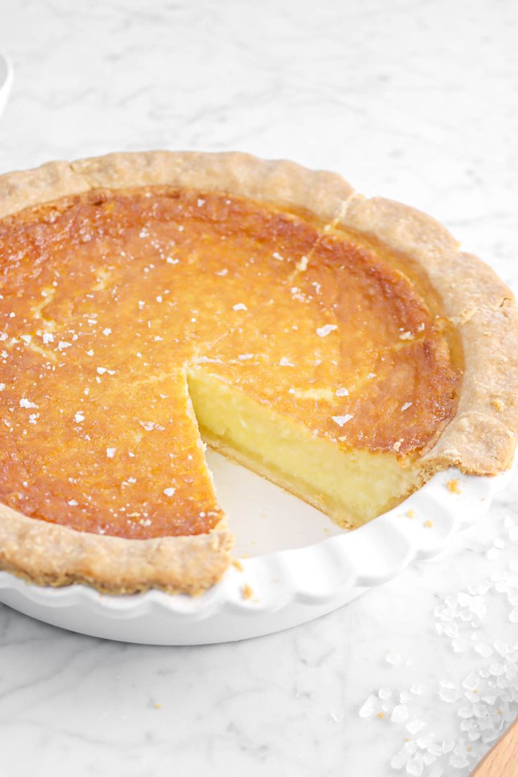 a pie sitting on top of a white plate