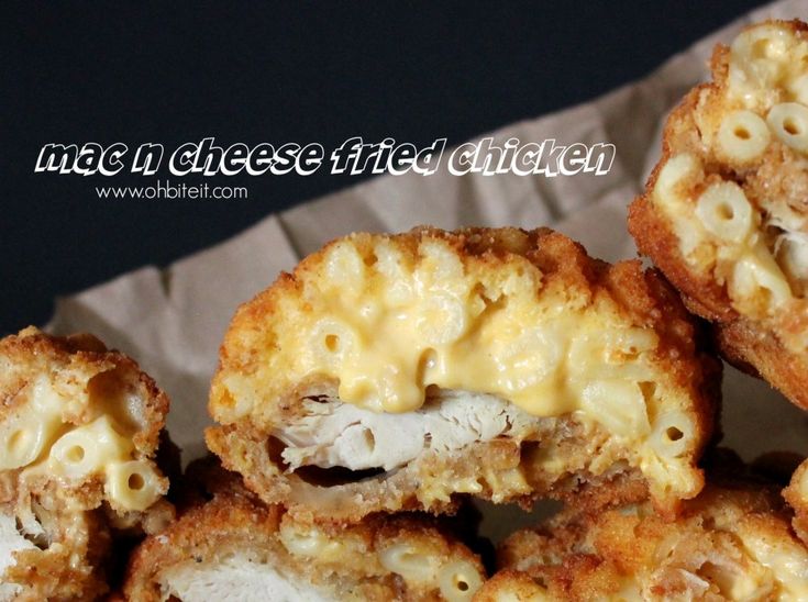 mac and cheese fried chicken is stacked on top of each other with the word mac n cheese in the middle