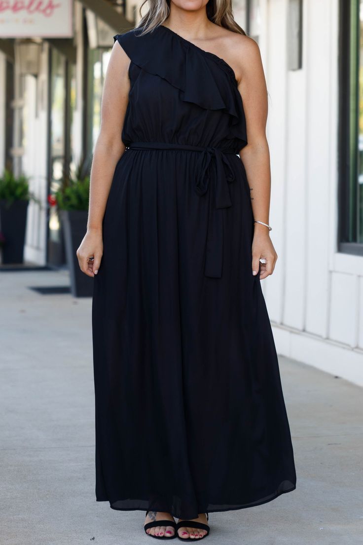 You'll look so fierce in this gorgeous dress! This dress has a beautiful black color with a flirty length and sleek material! This dress is perfect for any occasion, whether it is a plus on to a wedding or a fun holiday party! Style this dress with cute accessories and heels for a classy chic look! 100% Polyester Black Maxi Dress With Flattering Silhouette, Flowy Dresses For A Night Out, Black Summer Maxi Dress For Prom, Black Maxi Dress For Summer Prom, Chic Solid Maxi Dress With Flattering Silhouette, Black Sleeveless Maxi Dress For Bridesmaids, Black Sleeveless Maxi Bridesmaid Dress, Black Sleeveless Bridesmaid Maxi Dress, Black Maxi Length Bridesmaid Dress