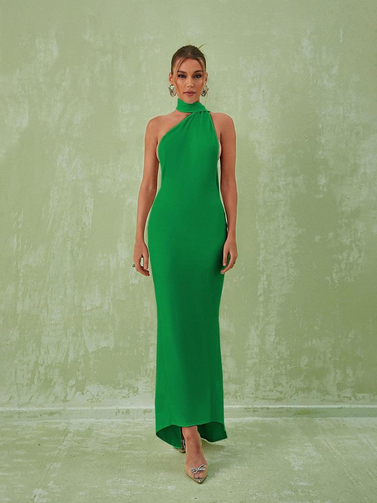 Toula Backless Maxi Dress In Green offers the perfect combination of coverage and elegance. The floor-skimming silhouette features a backless design with a ruched detail that creates an alluring yet modest look. The lightweight fabric will keep you feeling cool and comfortable throughout the day. Material: 83% Polyester, 17% Spandex Stretch Factor: High Stretch Clean: Gentle machine wash Color may vary due to the lighting on images. The product images (without model) are the closest to the true