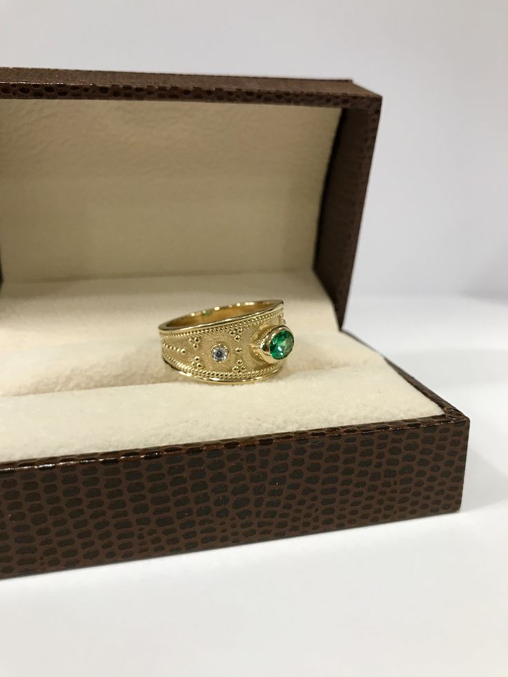 An Eye-Catching Medieval Ring with Shiny Gemstones on top. Gold Byzantine Ring- Emerald Ring - Medieval Ring - Etruscan Ring - Danelian Jewelry Following fine techniques to bring to life according to Etruscan & Byzantine design. ◾ Dimensions: 10.5mm width at the top. ◾ Bottom: 4.5mm width ◾ Materials: Choose your desired material for your ring, (Sterling Silver 925, 9K Solid Gold, or 14k Solid Gold). 18K Solid Gold option is also available, message us! Sterling Silver 925 option is available Byzantine Engraved Round Ring For Anniversary, Byzantine Style Yellow Gold Emerald Ring For Anniversary, Byzantine Ring With Bezel Setting For Gift, Byzantine Style Ring With Intricate Design As Gift, Byzantine Oval Wedding Rings, Byzantine Gold Emerald Ring For Anniversary, Byzantine Yellow Gold Emerald Ring For Anniversary, 14k Gold Byzantine Style Round Rings, Byzantine Rings With Intricate Design For Anniversary