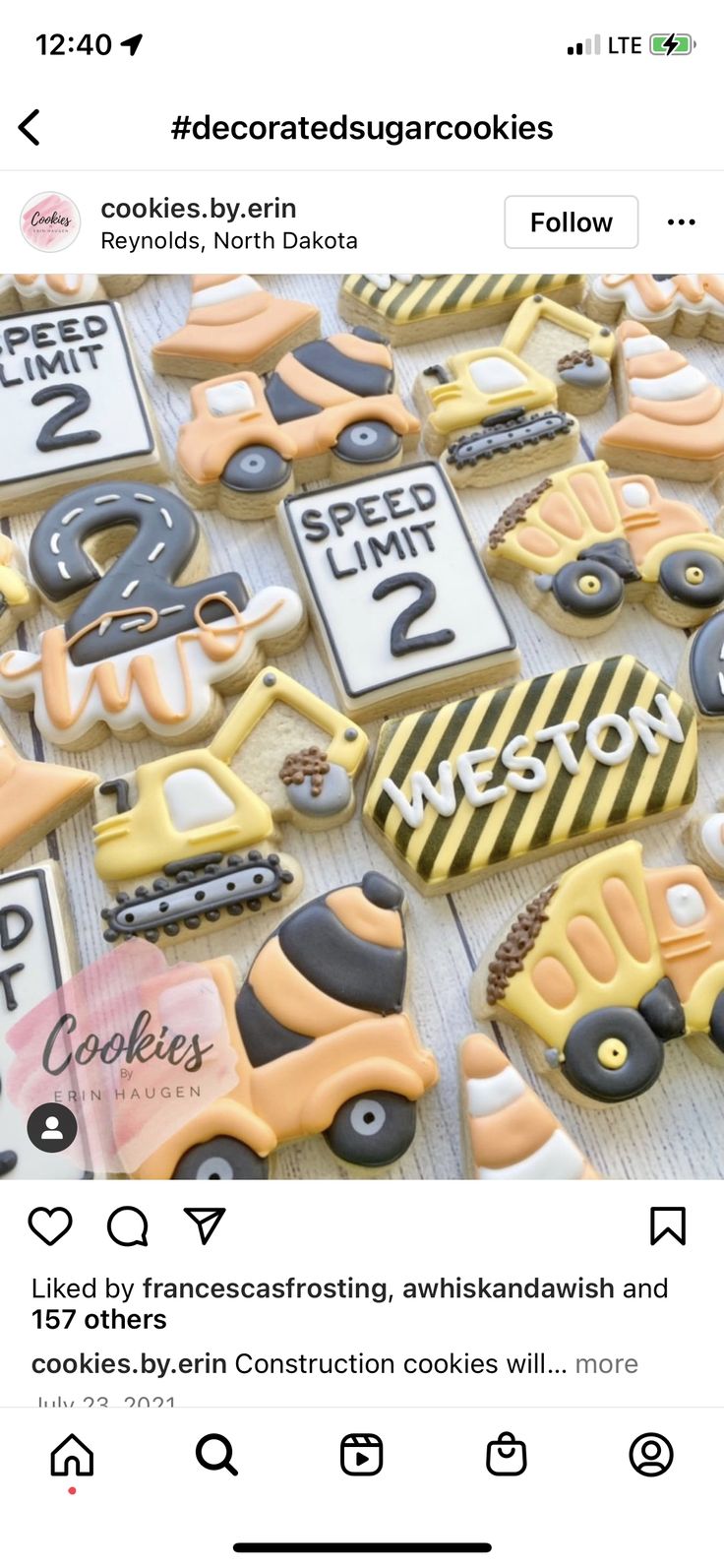 the cookies are decorated like construction trucks and cars, with numbers on each cookie sheet