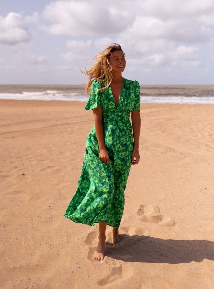 Green patterned, slightly flared short sleeve maxi dress with a deep v-neckline with an open back detail. The perfect dress for any occasion this summer - dress up or down! Not lined Not sheer Sizes: S / M / L S: Length 55.12 in - Width 12.20 in M: Length 55.91 in - Width 12.99 in L: Length 56.69 in - Width 13.78 in Contexture: 100% polyester Washing: handwash Summer Fashion For Women, Parisian Summer, Short Sleeve Maxi Dress, Short Sleeve Maxi Dresses, Sleeve Maxi Dress, Green Pattern, Maxi Dress With Sleeves, Perfect Dress, Summer Dress