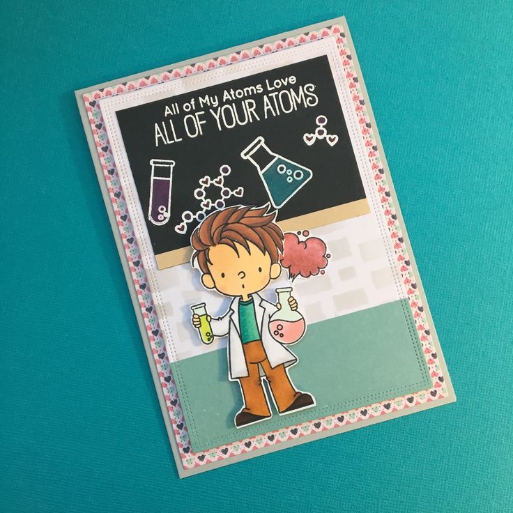 a handmade card with an image of a boy holding a beak and flasks