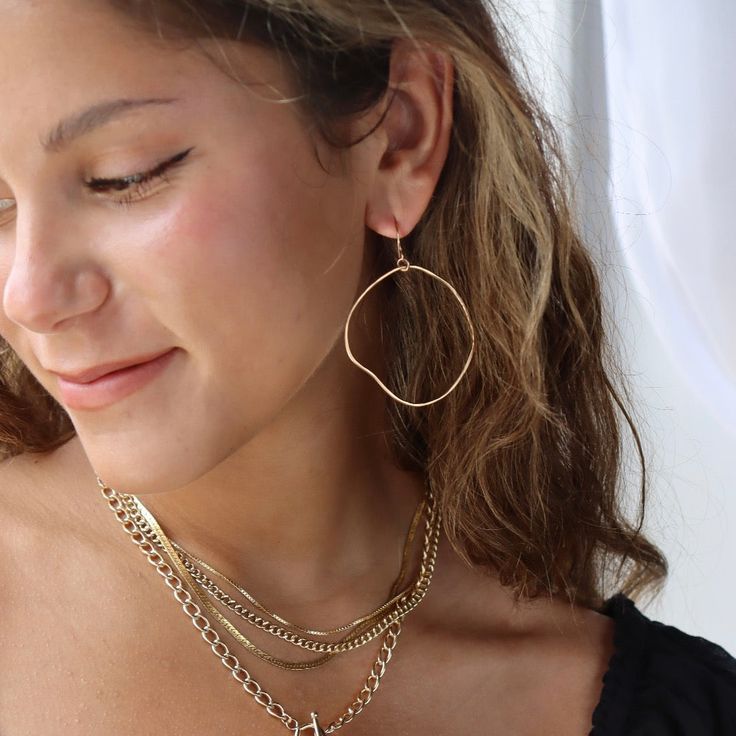 Effortless style and modern design are embodied in our Form Hoops! These lightweight organically hand-shaped earrings are an easy way to make a subtle statement– and each earring is as unique as the person who wears them. DETAILS14k gold fill or sterling silverEarrings measure approximately 1.5" x 2.5"Hypoallergenic, waterproof and nickel free Minimalist Recycled Gold Jewelry With Matching Earrings, Minimalist Hammered 14k Gold-filled Jewelry, Trendy 14k Gold-filled Drop Earrings, Trendy 14k Gold Filled Drop Earrings, Trendy Single Earring In 14k Gold Filled, Trendy Single 14k Gold Filled Earring, Modern Gold Plated Earrings For Everyday Wear, Trendy 14k Gold Filled Single Earring, Chic Nickel-free Yellow Gold Jewelry