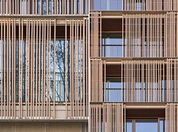 the facade of an office building with wooden slats on it's sides and windows