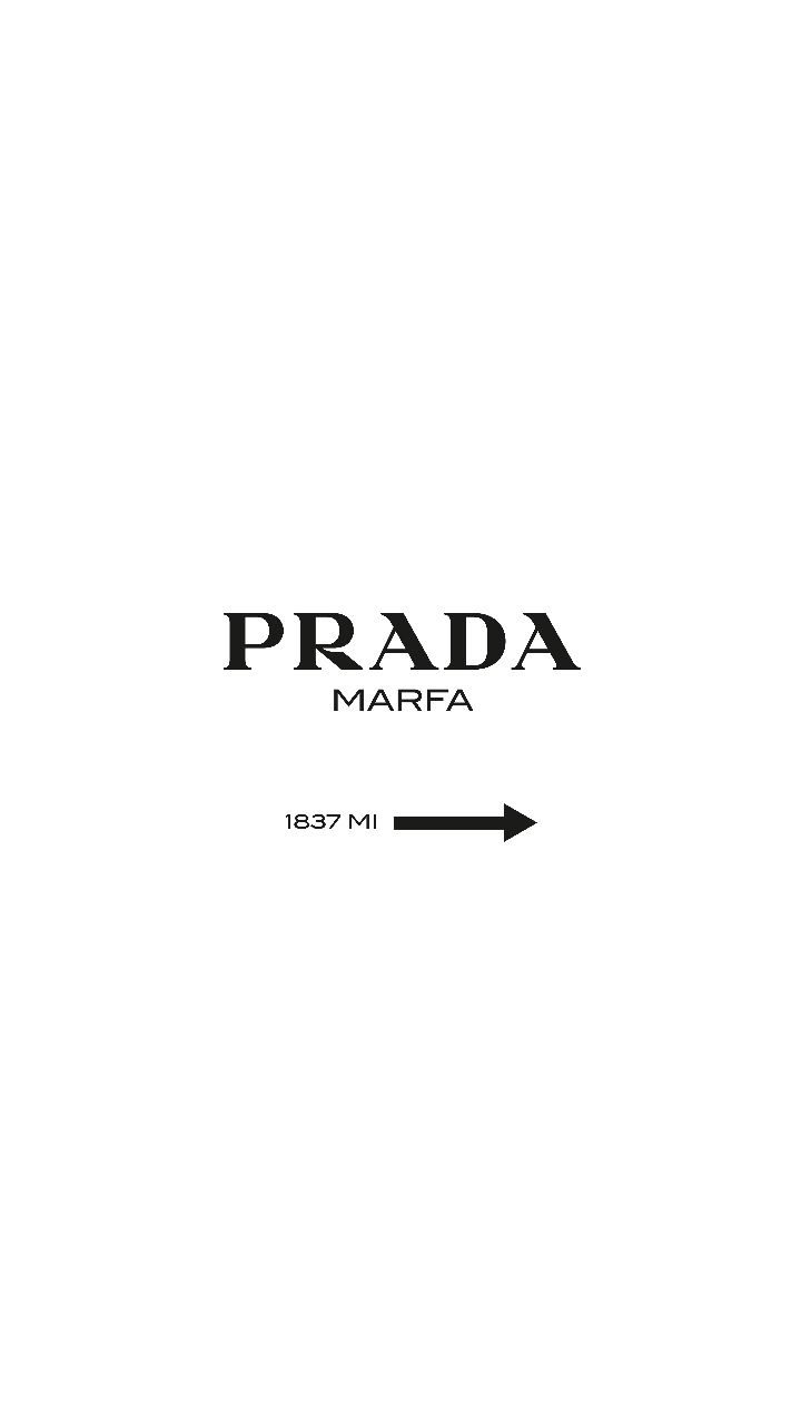 the prada marfa logo with an arrow pointing to it