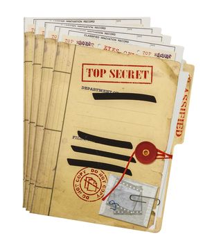 a stack of top secret envelopes sitting on top of each other in front of a white background