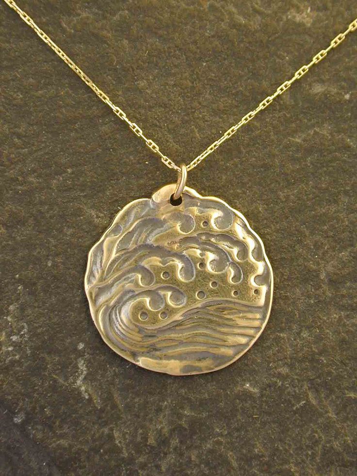 "The Wave pendant is 14K Gold. You may choose a 16\", 18\" or 20\" 14K Gold Chain as pictured. This Wave pendant measures 1\" in diameter. I hand cast all my pieces using the lost wax casting method. Please ask your needs. You may call me with questions, often I am out so please use my machine. 831-476-3176. Satisfaction Guaranteed! This piece is made and ready to ship This piece ships USPS First Class Insured I send items USPS First Class unless otherwise directed. I send as soon as I can, usua Engraved Bronze 14k Gold Necklaces, Artisan Engraved Yellow Gold Necklace, Handmade Custom Necklace In Yellow Gold, Artisan Necklace With Round Pendant, Cast Jewelry, Gold Medallion Jewelry Hand Cast, Artisan Hand Cast Necklace With Round Pendant, Gold Medallion Hand Cast Jewelry, Bronze Hand Cast Round Pendant Necklace