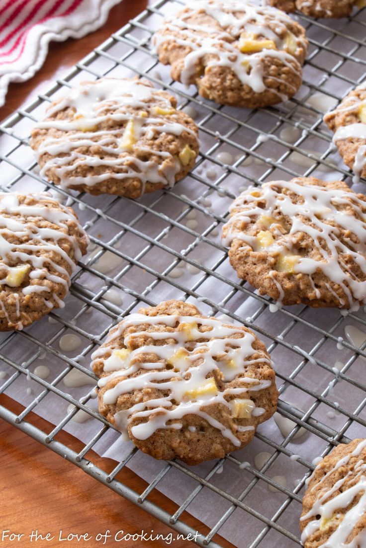 freshly baked cookies with icing on a cooling rack, ready to be eaten and served