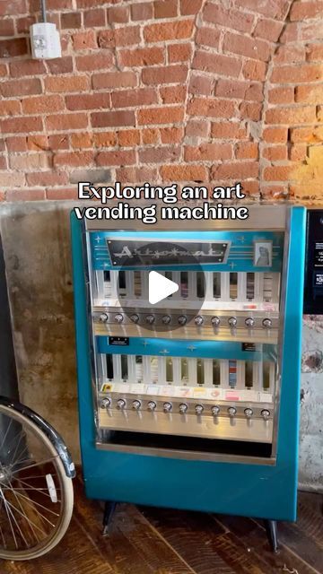 an old fashioned vending machine sitting next to a brick wall with the words, exploring and vending machine