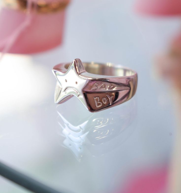 The cutest little star ring with a sad buy made from solid sterling silver or plated brass. His frowned face reminds you that some time it is ok to be a little sad.  Each sad boy is carved by hand, so there might be slight difference between the ring you receive and the one pictured.  *Details The ring is approximately 1.5cm (0.8in) wide You can choose between brass and sterling silver Silver or gold plated ♥ Every piece is carefully handcrafted in my studio in Thessaloniki ♥ ** The ring picture Funky Rings Silver, Frowned Face, Sterling Silver Star-shaped Signet Ring For Gift, Silver Sterling Silver Engraved Ring For Birthday, Cute Silver Rings For Birthday, Birthday Engraved Silver Sterling Ring, Star-shaped Stamped 925 Silver Ring As Gift, Star-shaped 925 Sterling Silver Rings For Gifts, Gold Star Ring