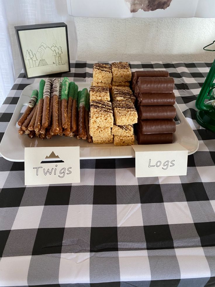 there are many different types of food on the table together, including cookies and crackers