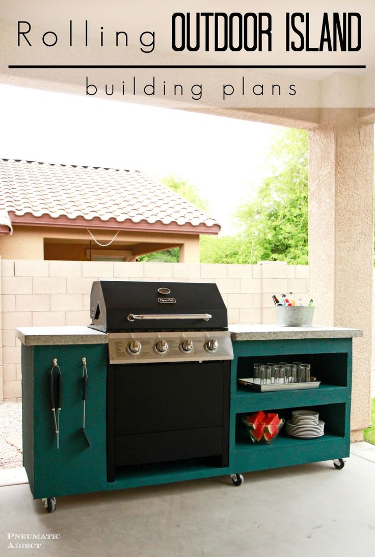 an outdoor kitchen with green cabinets and black grill