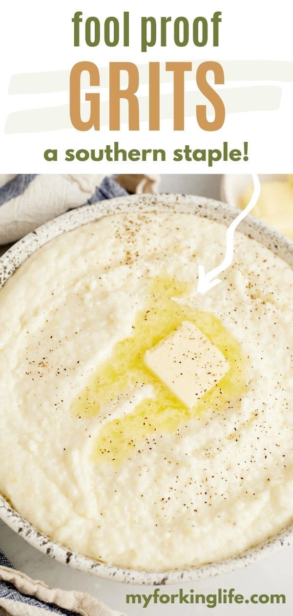 a bowl filled with grits and butter on top of a table