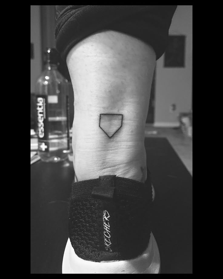 Home plate tattoo on ankle Baseball Tattoos Ideas, Fine Line Baseball Tattoo, Baseball Softball Tattoo, Baseball Diamond Tattoo, Baseball Related Tattoos, Baseball Home Plate Tattoo, Baseball Number Tattoo, Matching Baseball Tattoos, Small Baseball Tattoo For Women