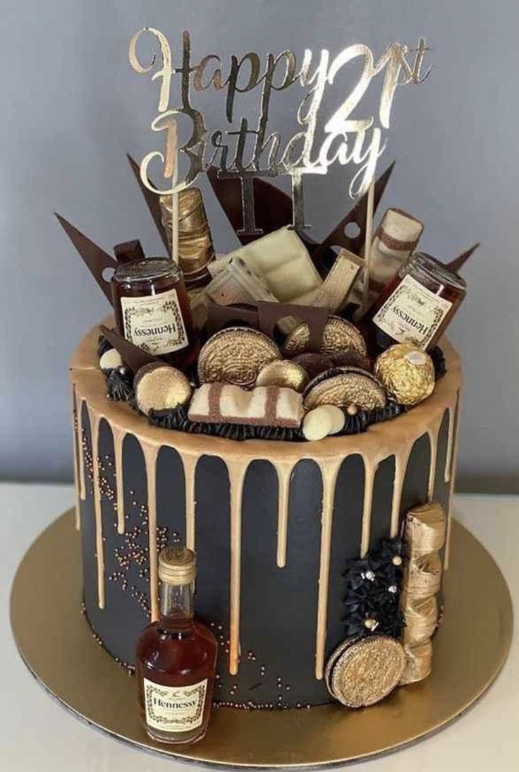 a birthday cake decorated with liquor and cookies