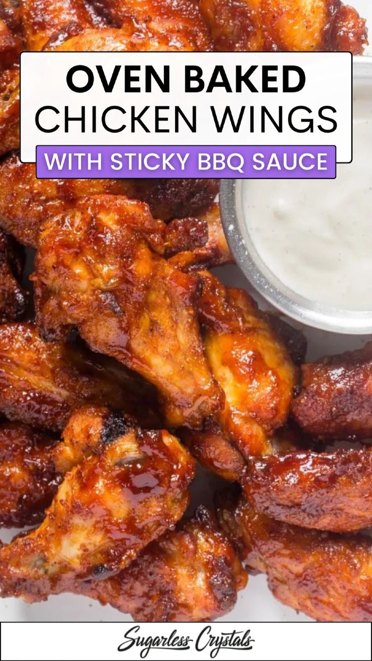 oven baked chicken wings with sticky bbq sauce on the side and text overlay that reads oven baked chicken wings with sticky bbq sauce