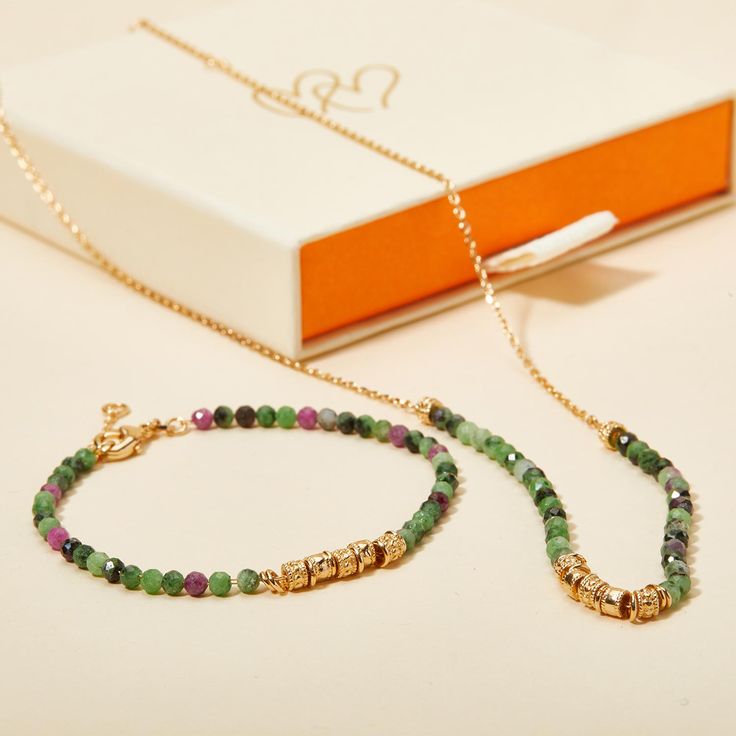 Delicate details meet eye catching gemstones with our Green Gemstone Necklace. Each necklace features a unique array of semi-precious gemstones and dainty gold details to add style to any jewelry collection.&nbsp;18K Champagne Gold PlatedChain length: 17.7, adjustable to 16.5 and 15.7Gemstone Rubis Zoisite: 3mmSent with love in a complimentary gift box Green Gemstone Bracelet, Green Gemstone Necklace, Vacation Jewelry, Grandmother Gifts, Engraved Bracelet, Holiday Jewelry, Engraved Necklace, Delicate Details, Green Gemstones