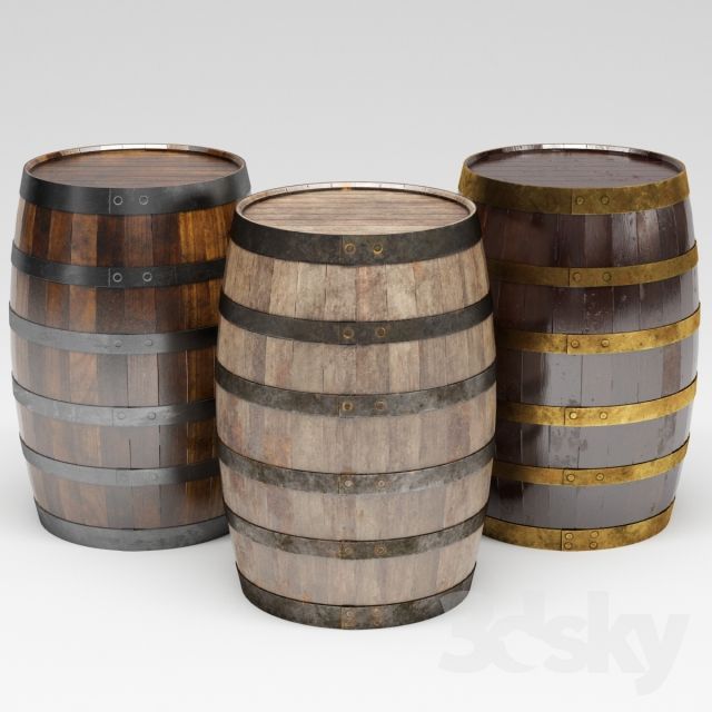 three wooden barrels sitting next to each other