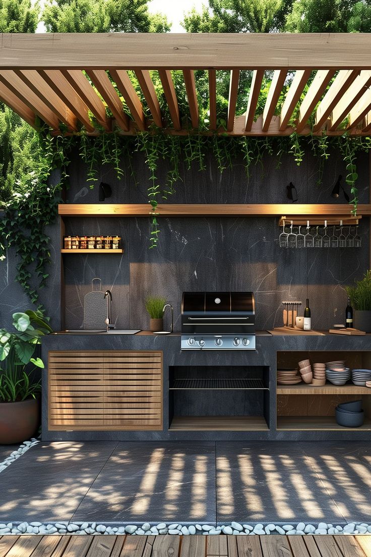 an outdoor kitchen with wooden shelves and plants on the wall, next to a grill