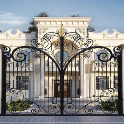 an iron gate is open in front of a large white building with columns and arches