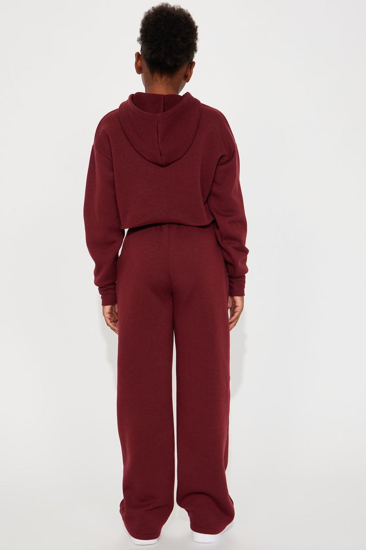 Available In Burgundy. Matching Fleece Pant Set Cropped Sweatshirt Hoodie Embroidered On Top And Bottom Leisure Verbaige Wide leg Pant Elastic Waistband Model Wears Size 10/12 Mommy & Me Takedown Of " Life Of Leisure Fleece Pant Set" 100% Polyester Imported | Mini Life Of Leisure Fleece Pant Set in Burgundy size 7/8 by Fashion Nova Burgundy Fashion, Woman Back, Cropped Sweatshirt, Wide Leg Pant, Fleece Pants, Pant Set, Mommy And Me, Sweatshirt Hoodie, Clothes For Sale