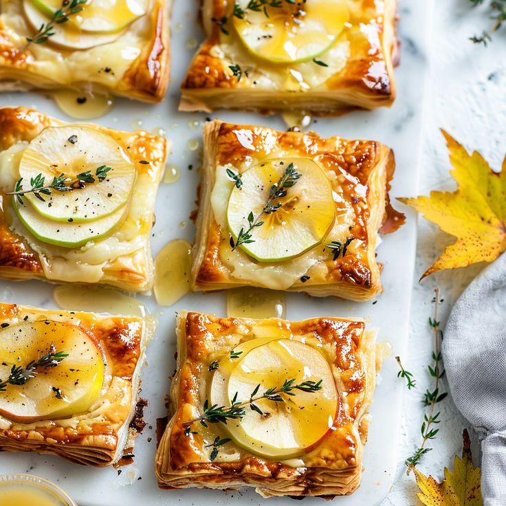 some food that is sitting on a white plate and has been cut up into squares