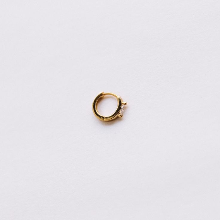 ~Sold as 1 earring ~Made with thick 18k gold plated on sterling silver~Set with brilliant white AAA grade diamond simulant~Inner Hoop diameter: 8mm~Outer Hoop diameter: 10 mm~Nickel Free & Lightweight, perfect for everyday wear Gold Diamond Hoop Piercings, Gold Cubic Zirconia Fine Jewelry Piercings, Single Cubic Zirconia Round Cut Earring, Single Round Cut Cubic Zirconia Earring, Gold Cubic Zirconia Piercings Fine Jewelry, Yellow Gold Cubic Zirconia Round Piercings, Gold Plated Huggie Single Earring, Gold Plated Huggie Single Earring Piercing, Gold Plated Single Huggie Earring