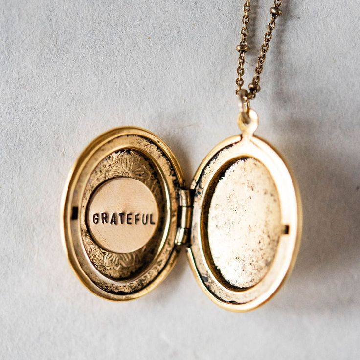 Personalize our popular Locket Necklaces with hand stamping on the inside! Lockets on 18" gold or silver plated satellite chain. Add on a small accent/birthstone for an additional $5 here: https://bit.ly/BVJBirthstoneAddOn Please tell us what you would like stamped on the charms in the "Notes" section at check out. Handcrafted in Little Rock, Arkansas Our images are the best representation of our designs and there may be some variation in your shipment due to the handmade nature of our products. Gold Medallion Locket Necklace Stamped 14k, Vintage Gold Locket Necklace Stamped 14k, Adjustable Brass Locket Necklace Gift, Antique 14k Stamped Locket Necklace Collectible, Engraved Silver-colored Brass Locket Necklace, Locket Necklaces, Little Rock Arkansas, Round Necklace, Hand Stamped Jewelry