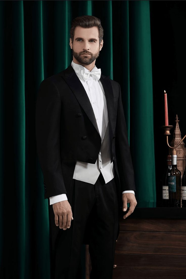 This men or women's formal black tuxedo with coat tails is the only drama any wedding or prom needs. This premium, black is an excellent look to convey a sense of confidence and power. Whether worn as a 2 piece or 3 piece with a vest, this looks dashing with penguin tales. Like this look but want to make some changes? Chat with a stylist or book an appointment. Fabric No: J47101/180 Color: Black Occasion: Formal Suit White Wedding Tuxedo, Tailcoat Tuxedo, Black Tuxedo Wedding, Tuxedo Suit For Men, Coat Tails, Made To Measure Suits, Wedding Tux, Black Suit Wedding, Formal Tuxedo