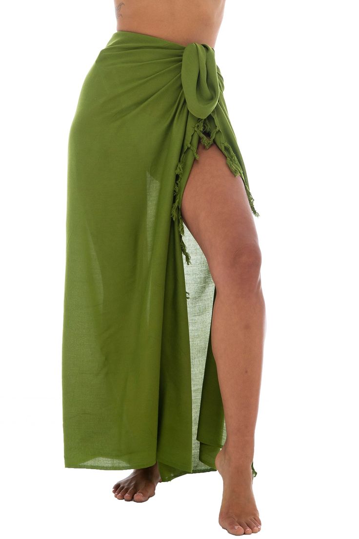 Lightweight Solid Sarong Beach Cover Up is 67 x 45 inches, large enough for use as a quick-drying beach blanket; fringe at both ends makes a pret Cotton Sarong For Beach Vacation, Cotton Sarong For Beach Season Vacation, Bohemian Green Sarong For Beach Season, Beachy Cotton Sarong For Beach, Green Sarong For Festival And Beach Season, Green Cotton Sarong For Vacation, Green Wrap Sarong For The Beach, Cotton Wrap Cover-up For Beach, Green Wrap Cover-up For Summer