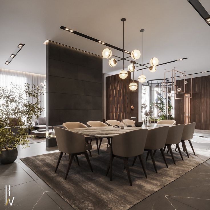 an elegant dining room with modern lighting and large table surrounded by beige upholstered chairs