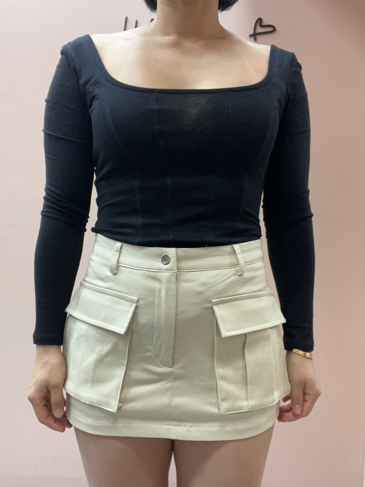 * Cargo Skort *70% Rayon 25% Nylon 5% Spandex *Stretch fabric *Double pocket *True to size Model is wearing SMALL MODEL DETAILS: height: 5’2 bust: 34b waist: 27" pant size: 2-4 weight: 125 lb Chic Fitted Cargo Pants With Side Pockets, Chic Fitted Bottoms With Patch Pockets, Fitted Bottoms With Patch Pockets, Chic Fitted Bottoms With Cargo Pockets, Fitted Utility Bottoms With Side Pockets, Fitted High Waist Cargo Pants With Patch Pockets, Fitted Cargo Pants With Side Pockets For Fall, Fitted Solid Bottoms With Pockets, Fitted Cargo Pants With Patch Pockets For Fall