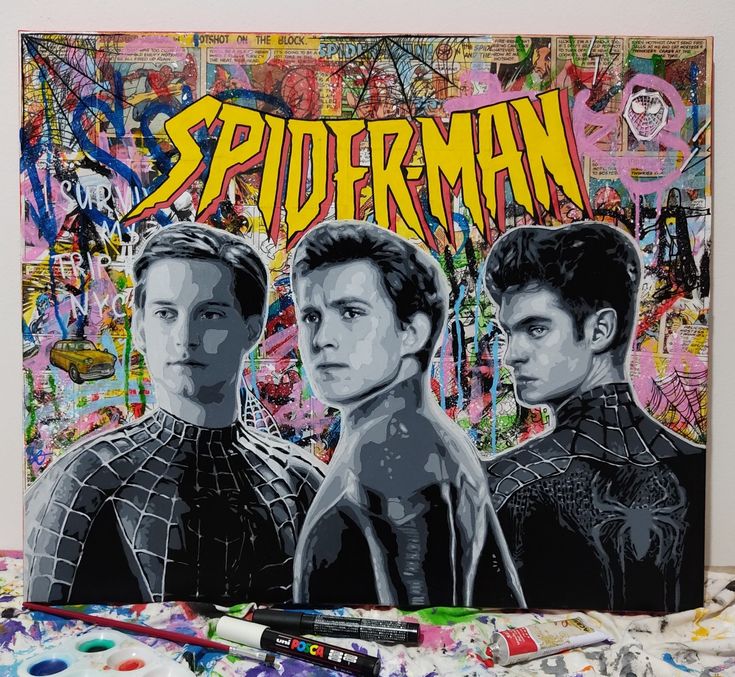 an image of two men in front of a spiderman poster with graffiti on it