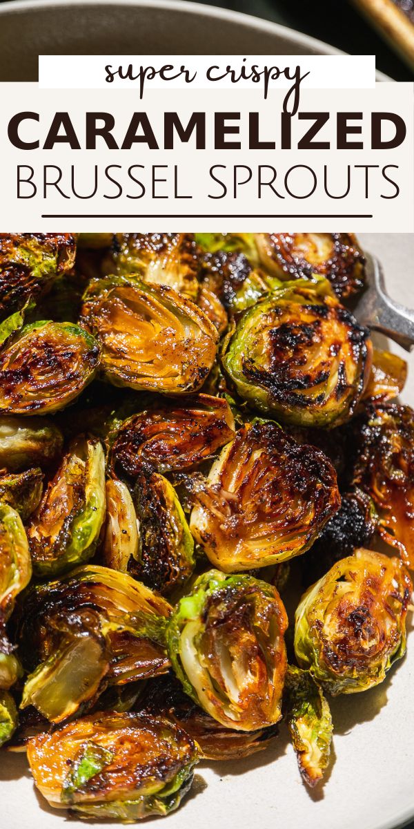 roasted brussel sprouts on a white plate with the title super crispy caramelized brussel sprouts